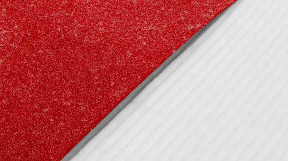 Nowhere. A red thread in the white landscape, effects of perspective and infinity