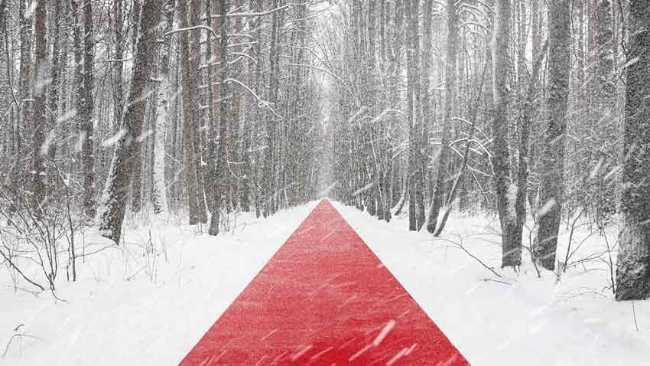 Nowhere. A red thread in the white landscape, effects of perspective and infinity