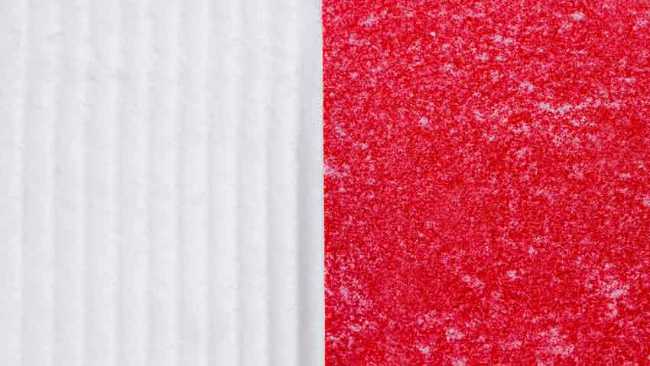 Nowhere. A red thread in the white landscape, effects of perspective and infinity