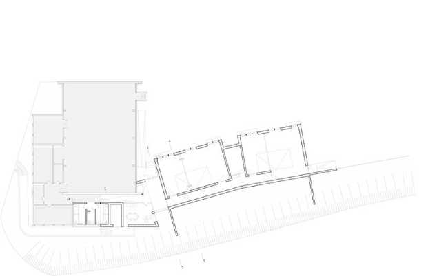 The Morel de Vindé Recreational Center welcomes you in a wooden embrace