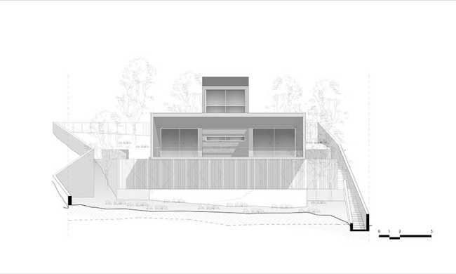 Un prisme en béton capture le panorama. Villa PNOES à Penteli