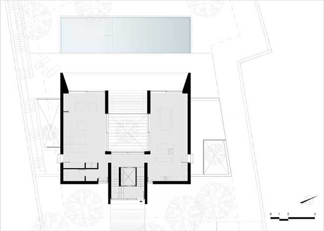 Un prisme en béton capture le panorama. Villa PNOES à Penteli