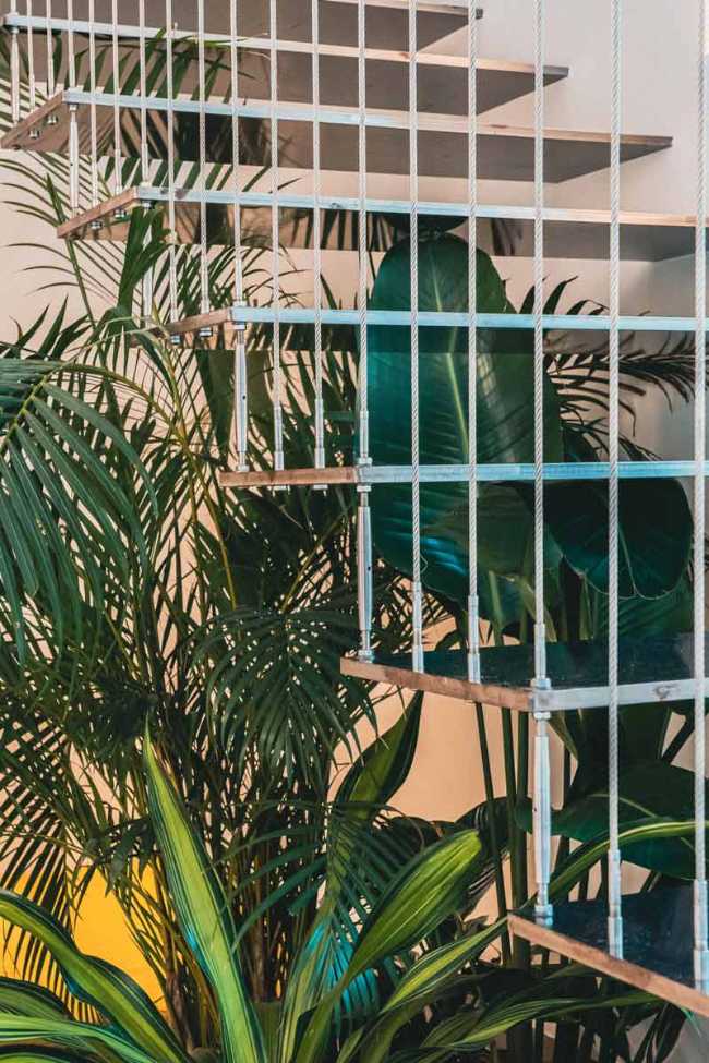 Luz y elegancia pintadas en un lienzo blanco en el ático Casa 0211.