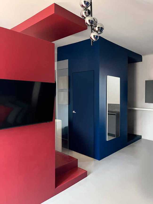 Cooper House, Milanese pied-à-terre is tinged with red and blue.