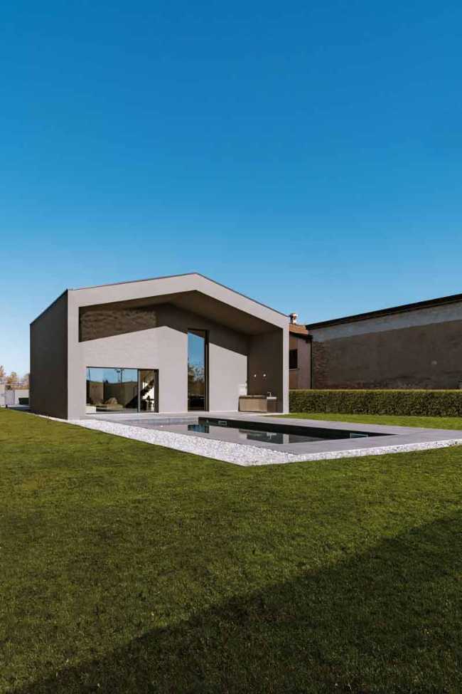 House Born: harmony of volumes where light embraces architecture