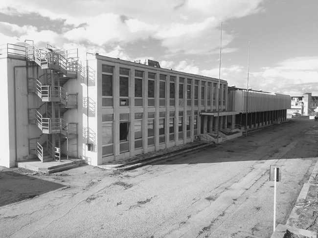 Headquarters Capua1880: landmark d'une transformation régénérative