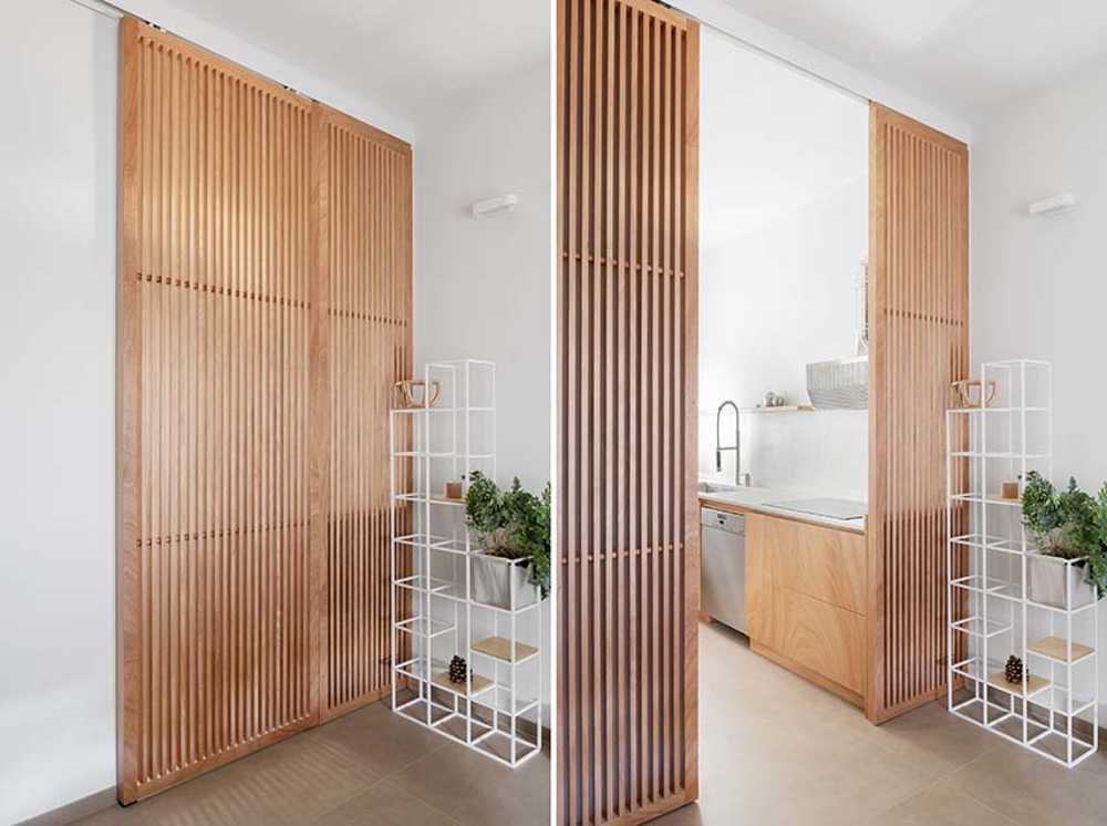 Maison à Gualdo. Mobilier flexible pour moduler l'intimité et la lumière