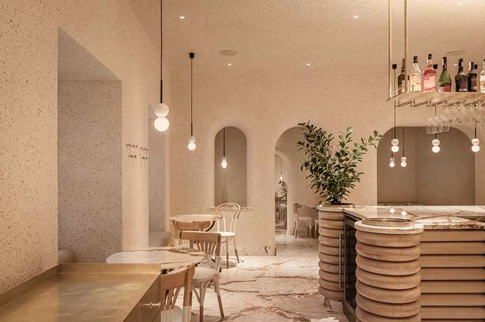 Eggshells and caramel veined marble. The Cukiernia pastry shop