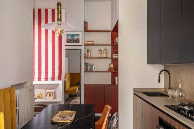 A symphony of colors dances among the rooms of the Sottocorno apartment.