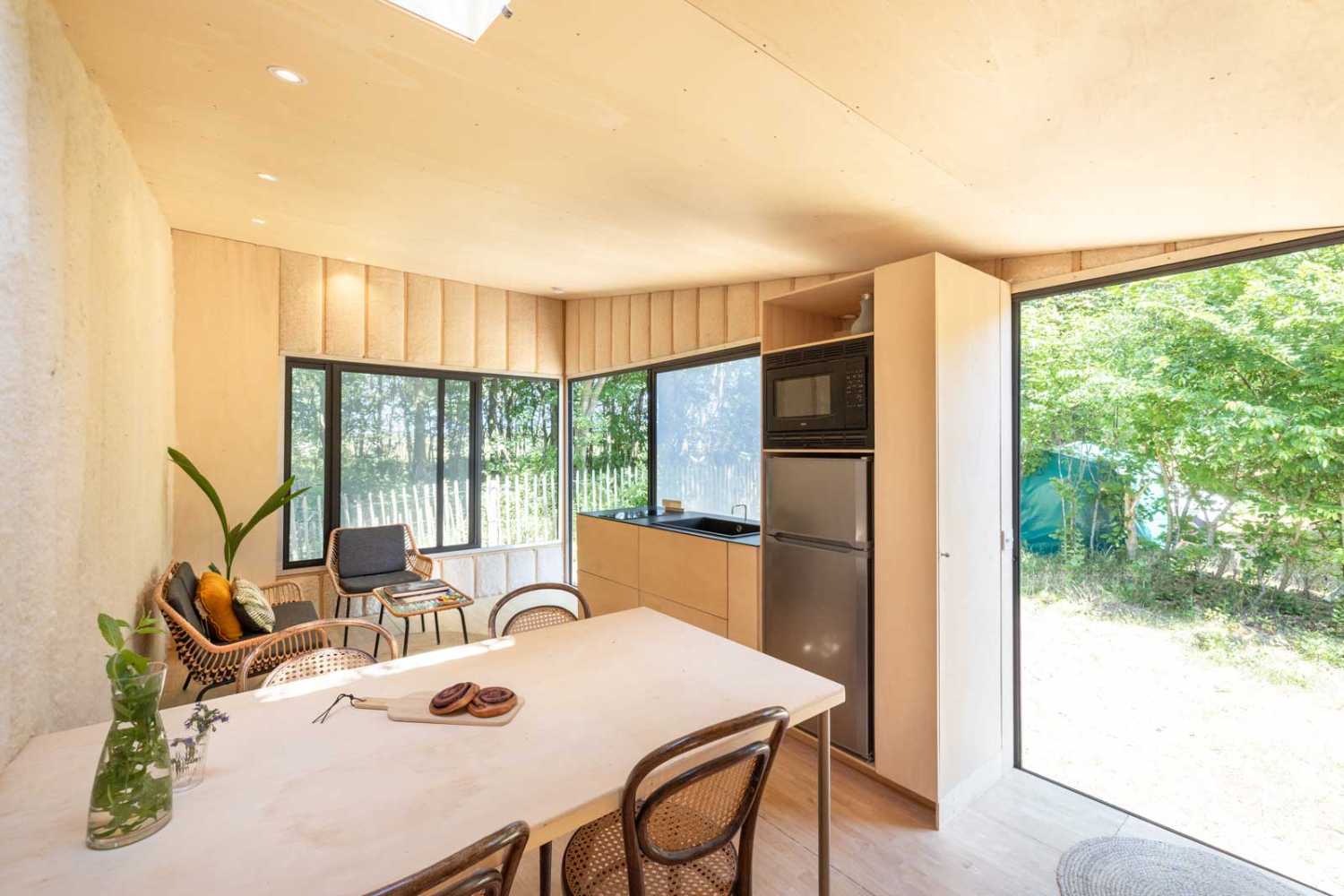 Minimal, smart, and sustainable: the concept of the nomadic architecture Tiny house Yurt.