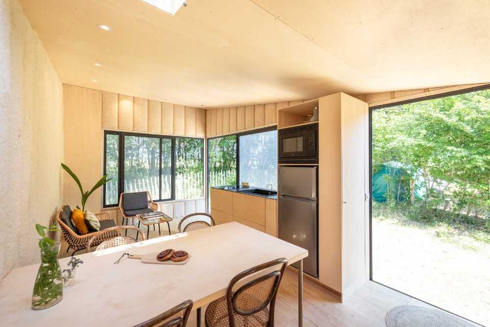 Minimal, smart, and sustainable: the concept of the nomadic architecture Tiny house Yurt.