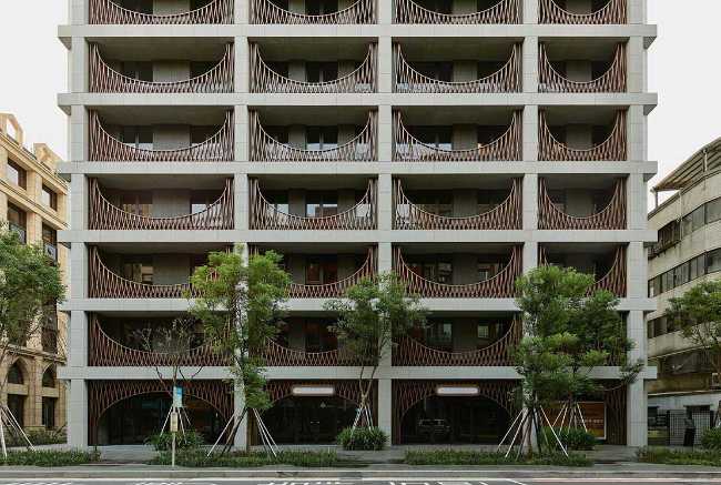 Edificio residencial en Zhishan: formas arquetípicas y materiales de alta calidad