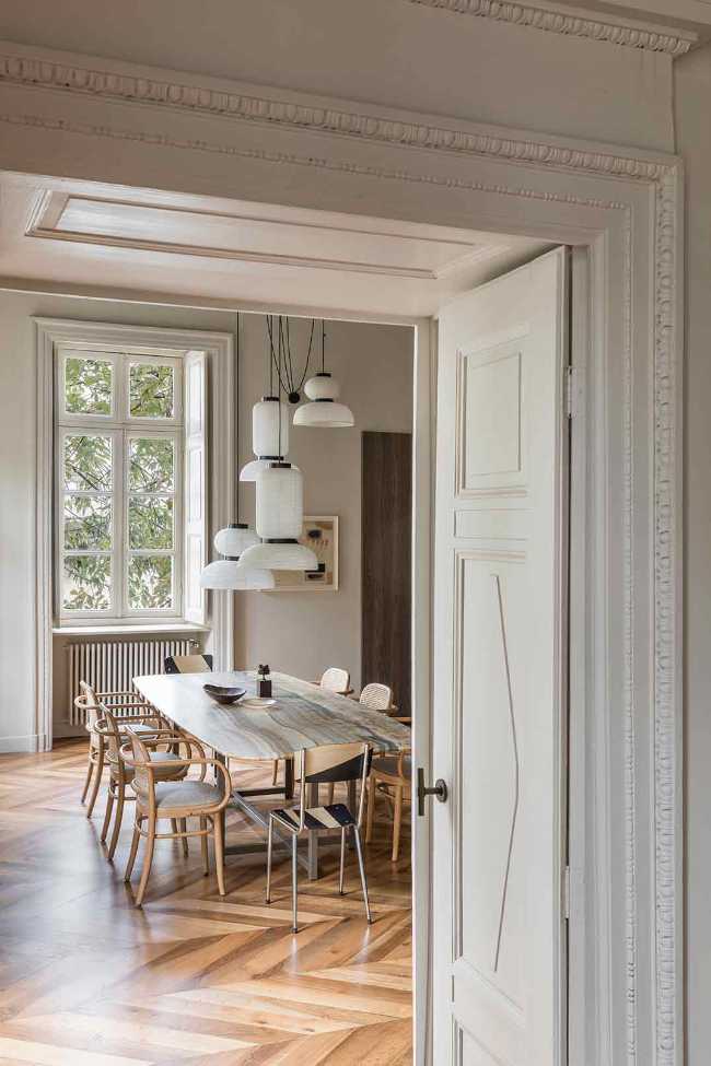 Apartamento SL, los detalles de la restauración de lujo en un edificio protegido.