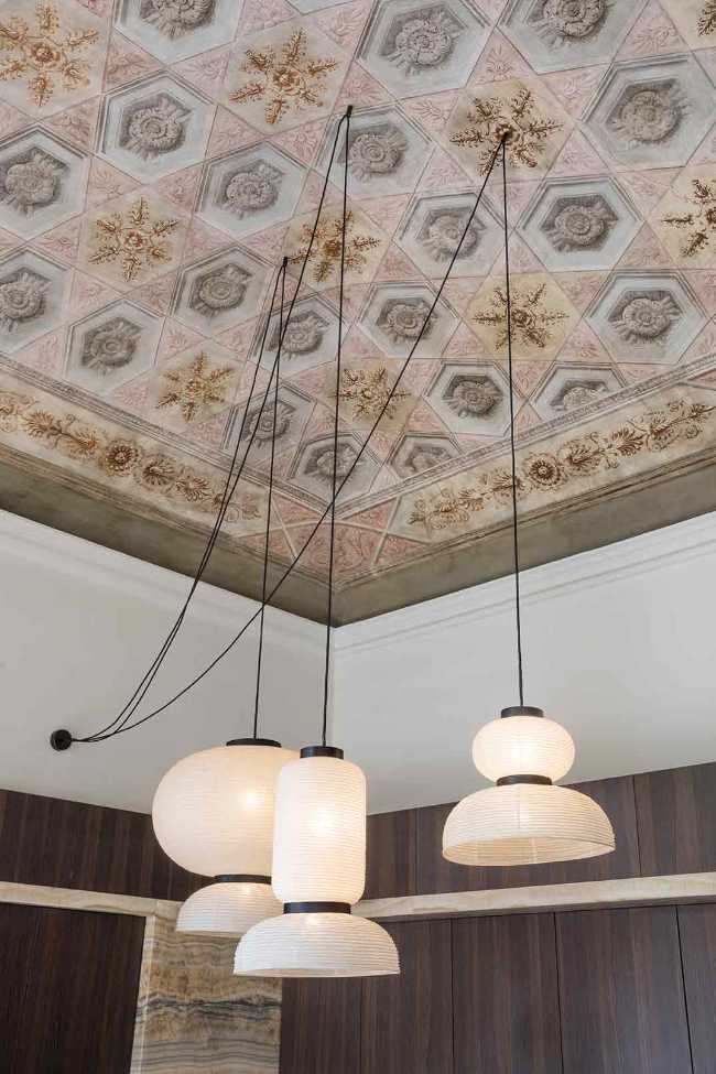 Apartamento SL, los detalles de la restauración de lujo en un edificio protegido.