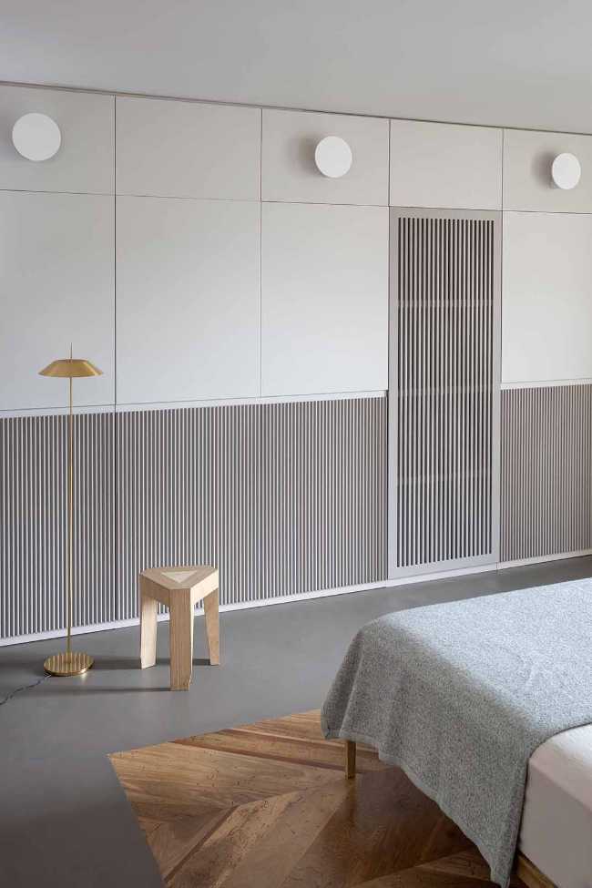 Apartamento SL, los detalles de la restauración de lujo en un edificio protegido.