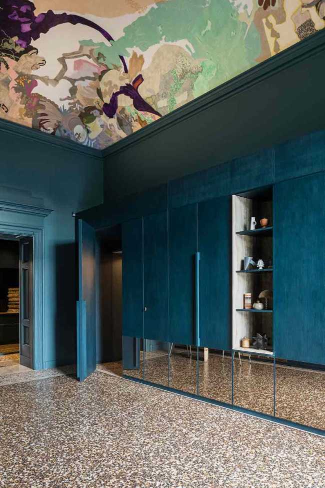 Apartamento SL, los detalles de la restauración de lujo en un edificio protegido.