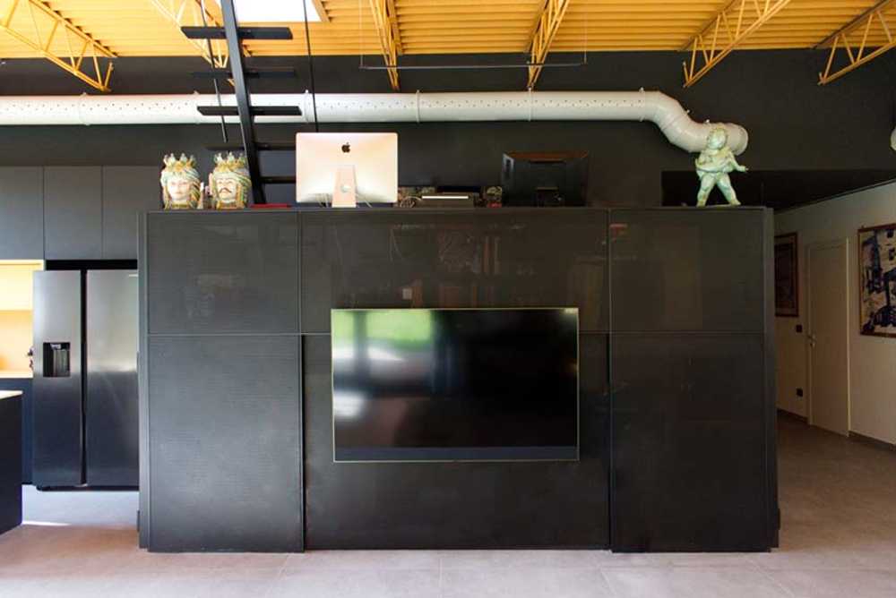 Loft ex-carrocería: una desafiante reconversión estética y funcional