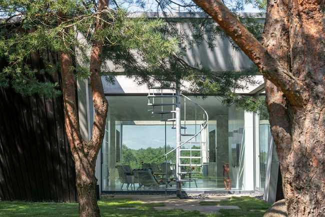 Villa O: una scultura circolare tra lago e natura