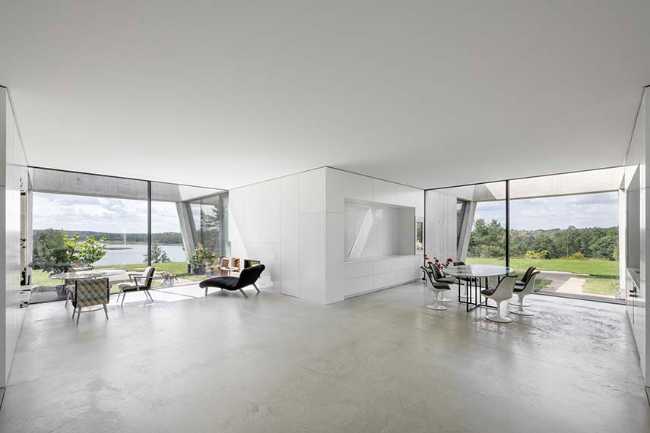 Villa O: una scultura circolare tra lago e natura