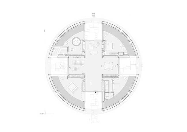 Villa O: una scultura circolare tra lago e natura