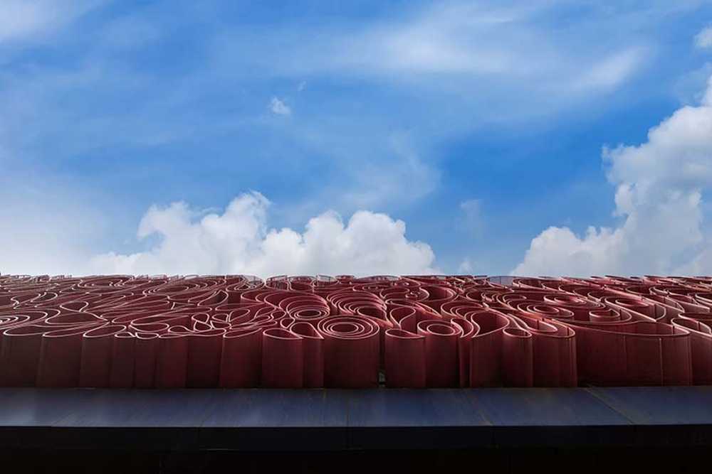 Textile waves. An architectural identity for Handtex Industries.