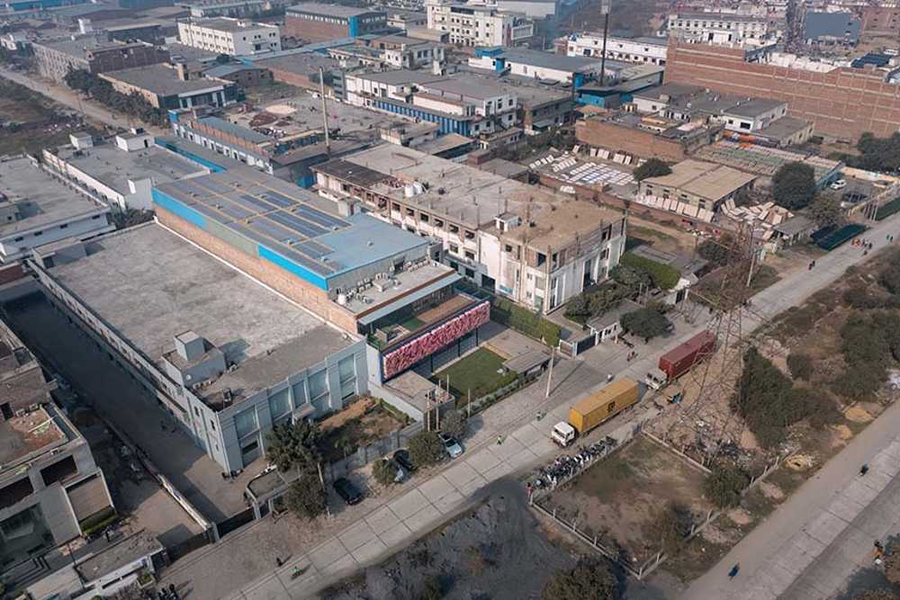 Textile waves. An architectural identity for Handtex Industries.