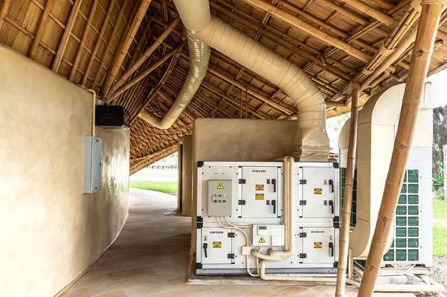 Architecture studio on water's edge. Organic temple of creativity