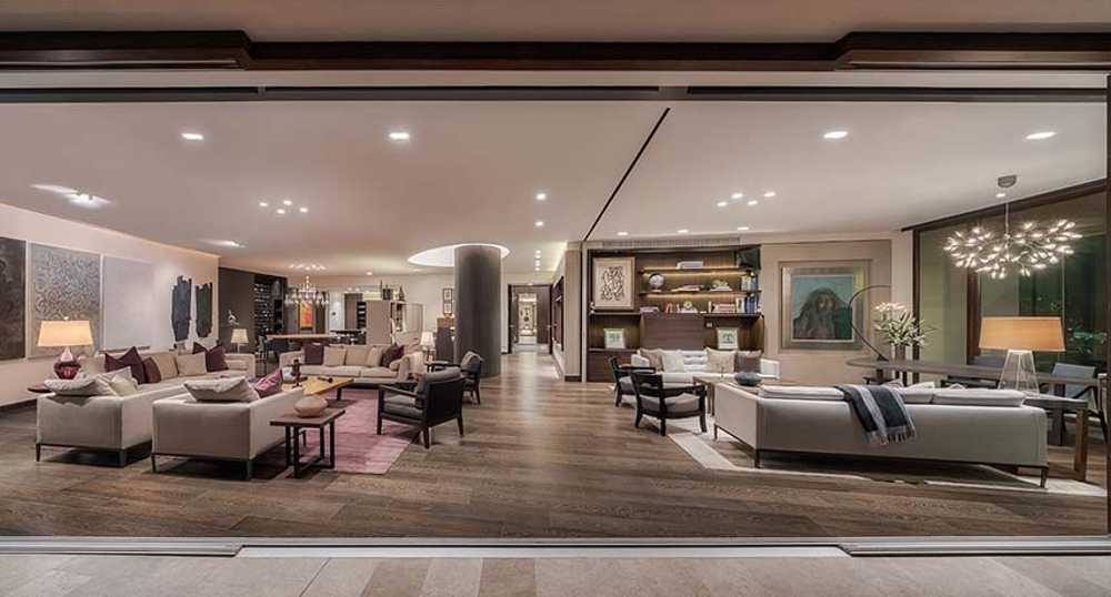 Paredes corredizas: el secreto de los 700 metros cuadrados del Departamento R&J