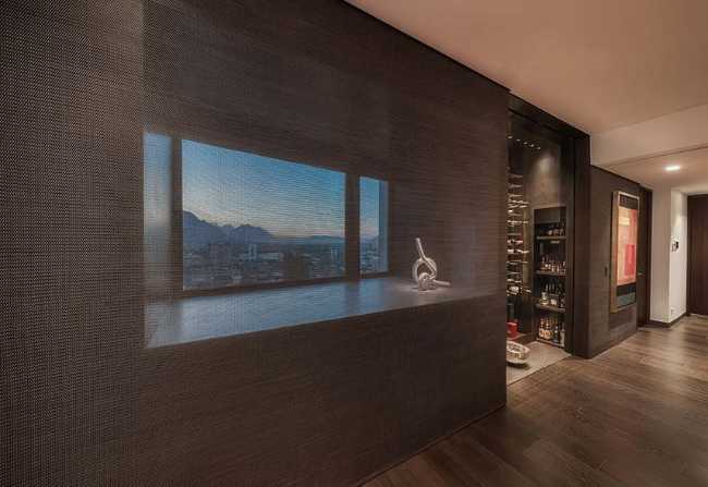 Paredes corredizas: el secreto de los 700 metros cuadrados del Departamento R&J