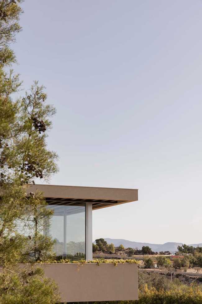 Un pabellón transparente entre la naturaleza y la arquitectura.