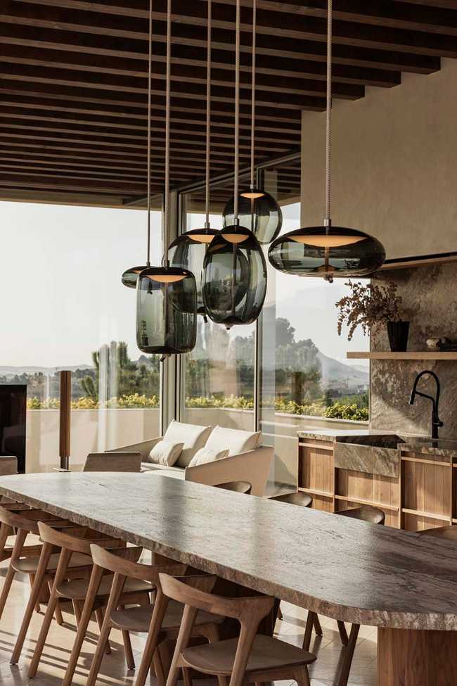 Un pabellón transparente entre la naturaleza y la arquitectura.