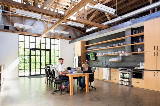 office with window and kitchen
