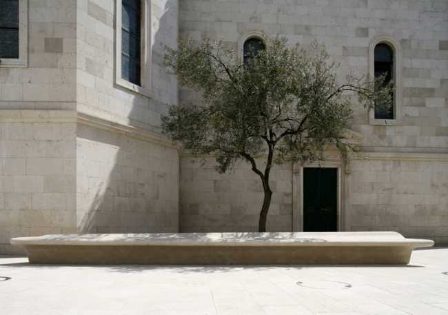 Stone bench in a corner of the square