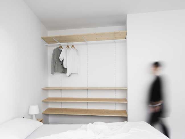 Detail of the exposed wooden wardrobe