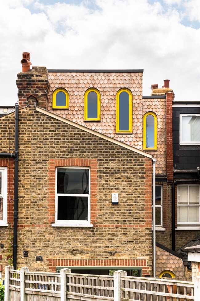 Exterior showing the brick part and the coated part