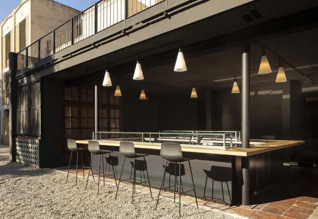 The rectangular high table that remains partly covered