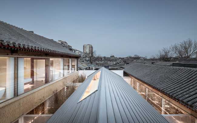 Layering Courtyard: nuovo e vecchio tra pubblico e privato