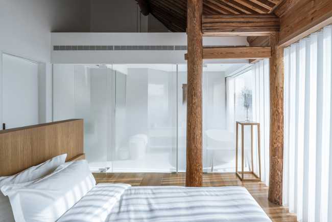 Layering Courtyard: nuovo e vecchio tra pubblico e privato