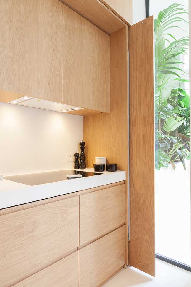 foldaway kitchen with full-height doors