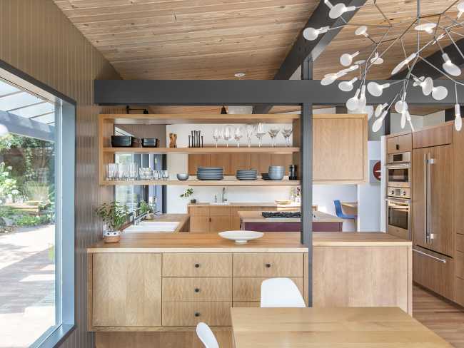The custom-made kitchen in wood