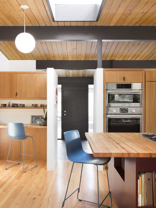 the wooden table in the dining area