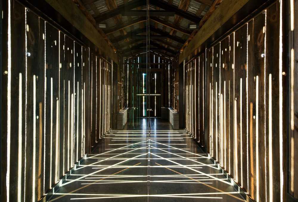 The exterior of the restored wooden barn
