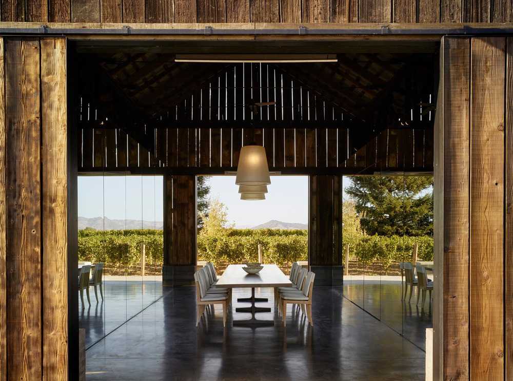 The exterior of the restored wooden barn