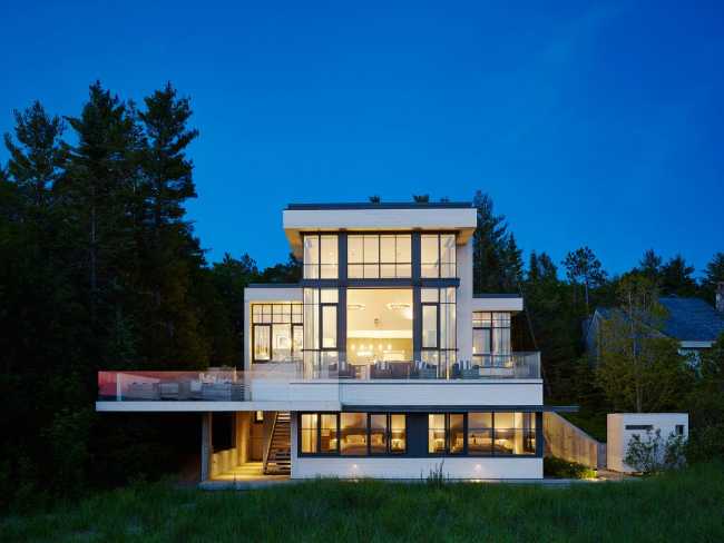 The large glazed openings of the house