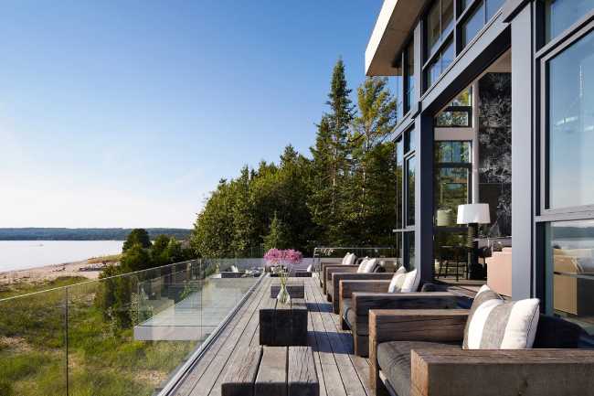 The living room on the terrace with the wooden floor
