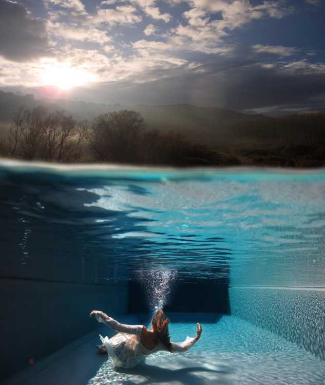 Swimming pool and hilly landscape