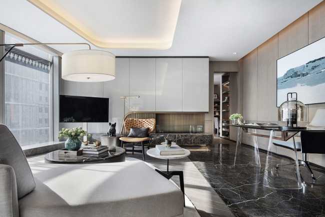 The living area and modernist furnishings that coordinate various materials