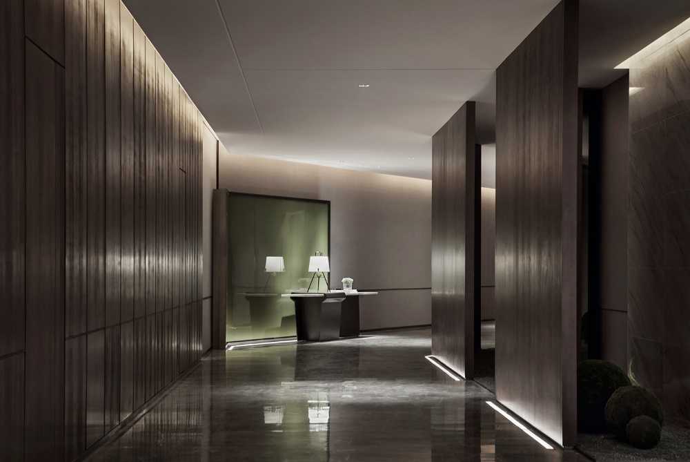 The large kitchen with exposed shelves and stone floor