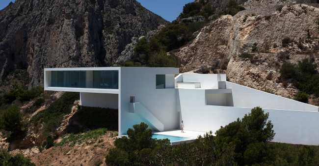 White villa suspended on the sea