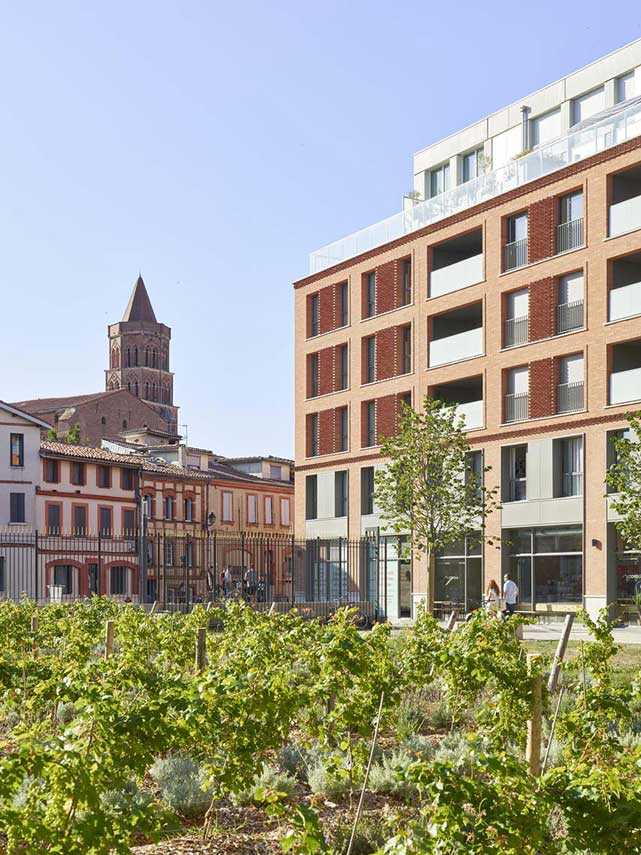 Cour du Dôme: edificio multifunzionale contemporaneo abbraccia la storia